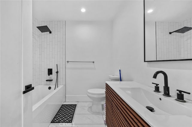 full bathroom featuring tiled shower / bath combo, toilet, and vanity