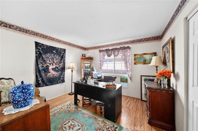 office area with hardwood / wood-style floors