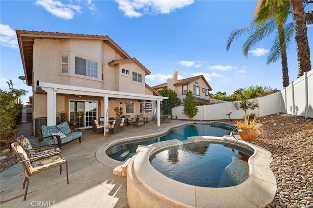 view of swimming pool with an outdoor living space and a patio area