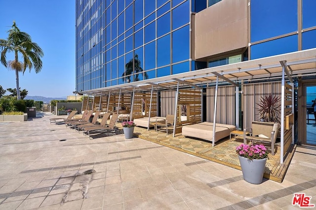 view of patio with a mountain view