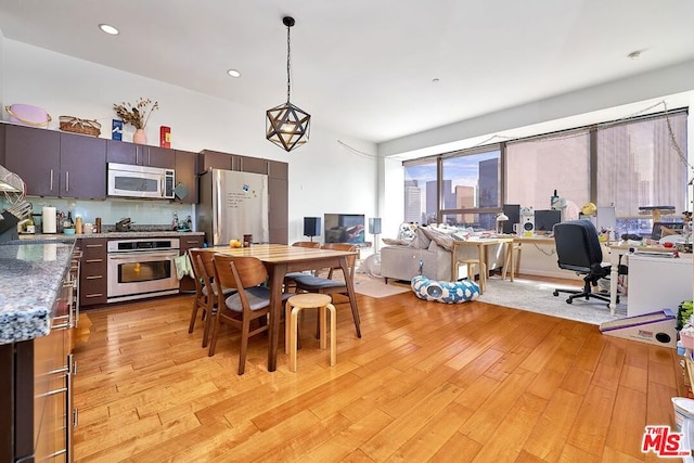 dining area featuring light hardwood / wood-style floors