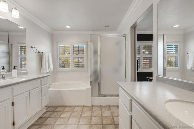 bathroom with ornamental molding, a healthy amount of sunlight, plus walk in shower, and vanity