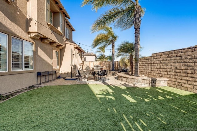 view of yard with a patio