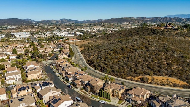 drone / aerial view featuring a mountain view