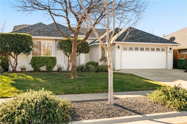 ranch-style house with a garage and a front lawn