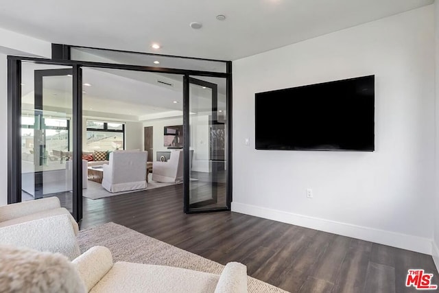 living room with dark wood-type flooring