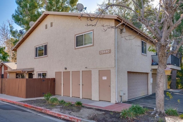 view of property exterior featuring a garage