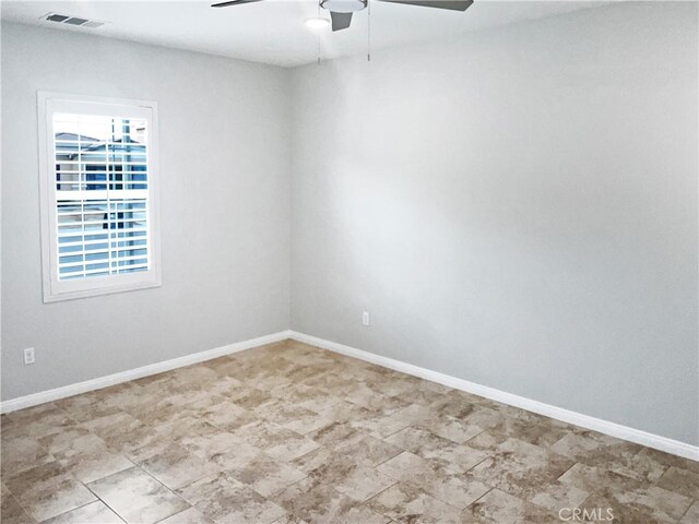 spare room featuring ceiling fan