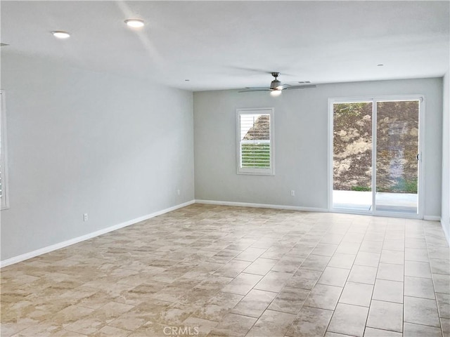 empty room featuring ceiling fan