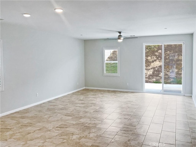 empty room featuring ceiling fan