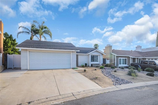 ranch-style home with a garage