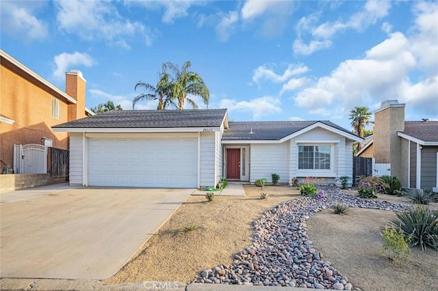 single story home with a garage