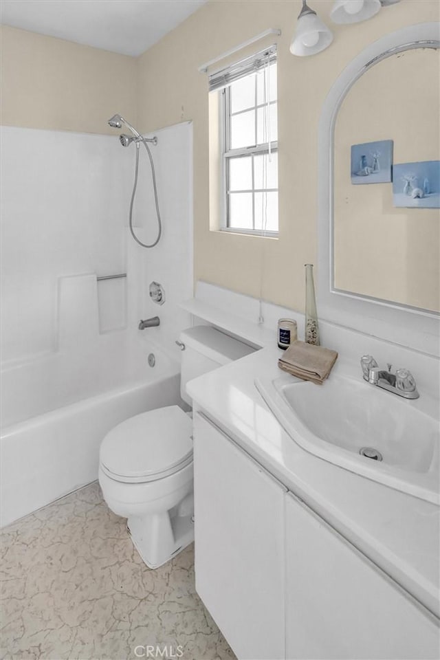 full bathroom featuring toilet, bathtub / shower combination, and vanity