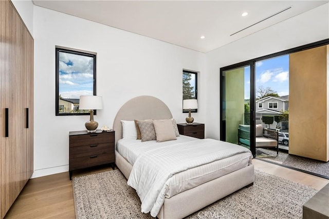 bedroom featuring light hardwood / wood-style floors