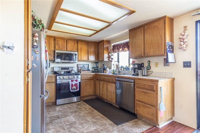 kitchen featuring sink and appliances with stainless steel finishes