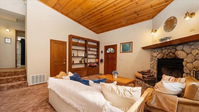 carpeted living room with high vaulted ceiling, wooden ceiling, and a fireplace