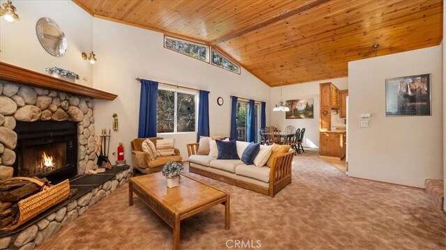 living room featuring a fireplace, light colored carpet, high vaulted ceiling, and wood ceiling