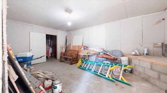 miscellaneous room with concrete floors