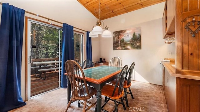 dining room featuring wooden ceiling, light colored carpet, lofted ceiling, and a notable chandelier