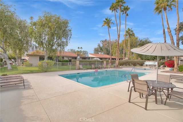 view of pool with a patio area