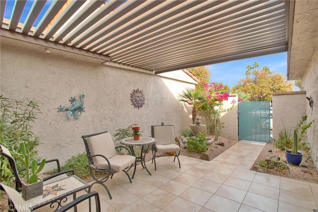 view of patio / terrace featuring a pergola