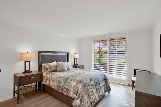 bedroom featuring light hardwood / wood-style flooring