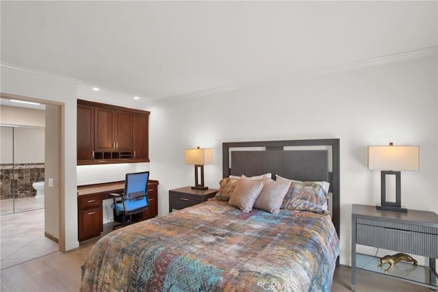 bedroom featuring crown molding and built in desk