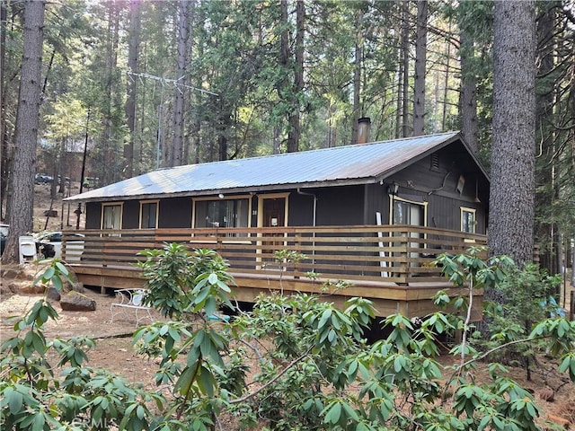 view of front facade featuring a wooden deck