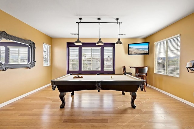 recreation room with pool table and light hardwood / wood-style floors