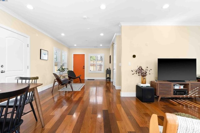 living room featuring ornamental molding and hardwood / wood-style floors