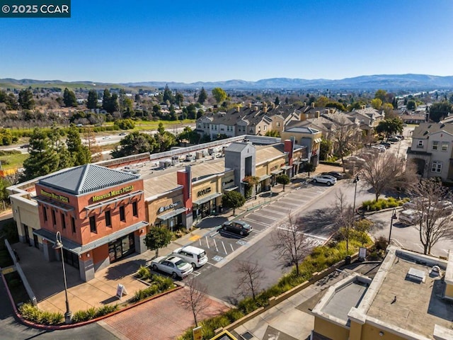 drone / aerial view featuring a mountain view