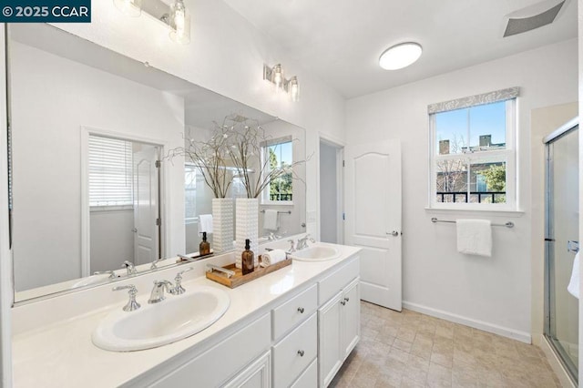 bathroom with vanity and walk in shower