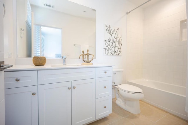 full bathroom with shower / tub combination, vanity, toilet, and tile patterned floors