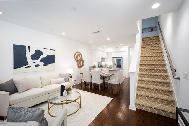 living room featuring dark hardwood / wood-style flooring