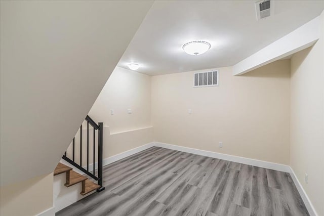 basement featuring light hardwood / wood-style floors