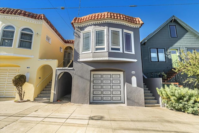 view of front of property featuring a garage