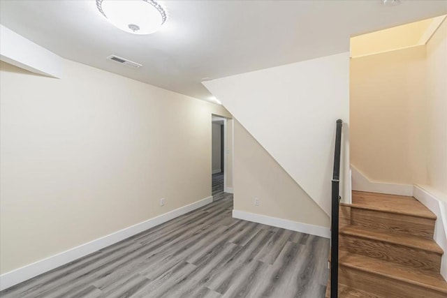 basement with wood-type flooring