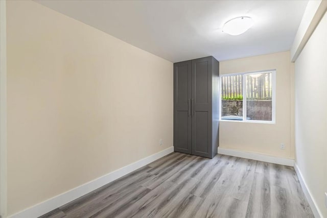 unfurnished room featuring light hardwood / wood-style floors