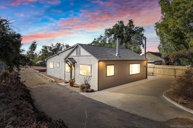 view of property exterior at dusk