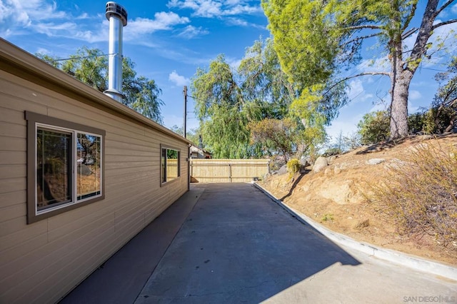 view of side of property featuring a patio