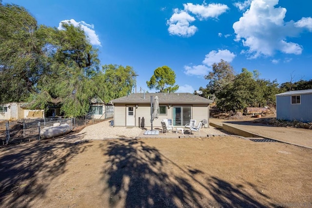 rear view of property with a patio