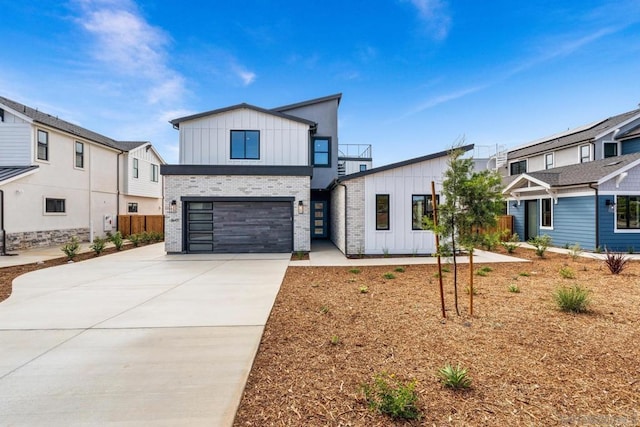 modern farmhouse featuring a garage