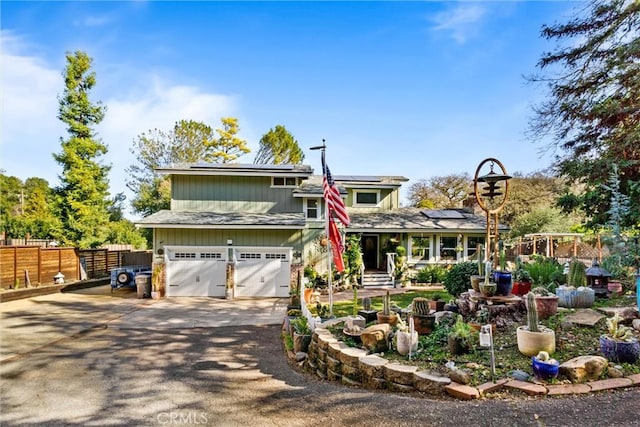 view of front of home featuring solar panels