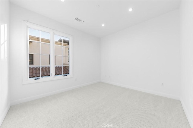 empty room with carpet flooring