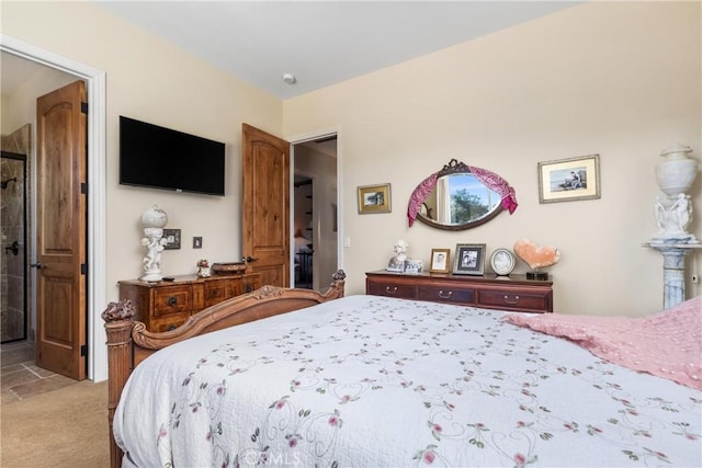 bedroom featuring light colored carpet