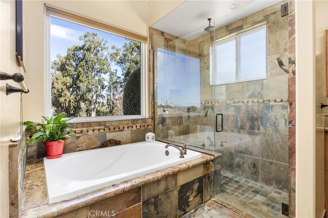 bathroom with independent shower and bath