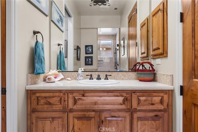 bathroom featuring tasteful backsplash and vanity