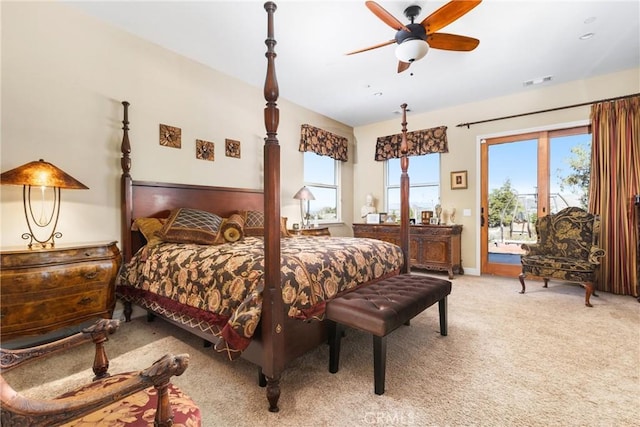 carpeted bedroom with access to outside and ceiling fan