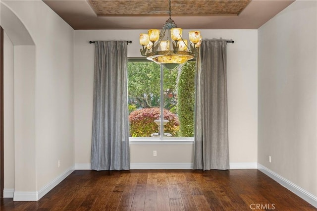325 Red Oak Way, Arroyo Grande, CA 93420 - unfurnished room featuring wood-type flooring, a chandelier, healthy amount of natural light, and baseboards