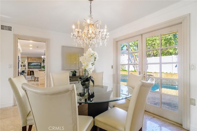 dining room with ornamental molding